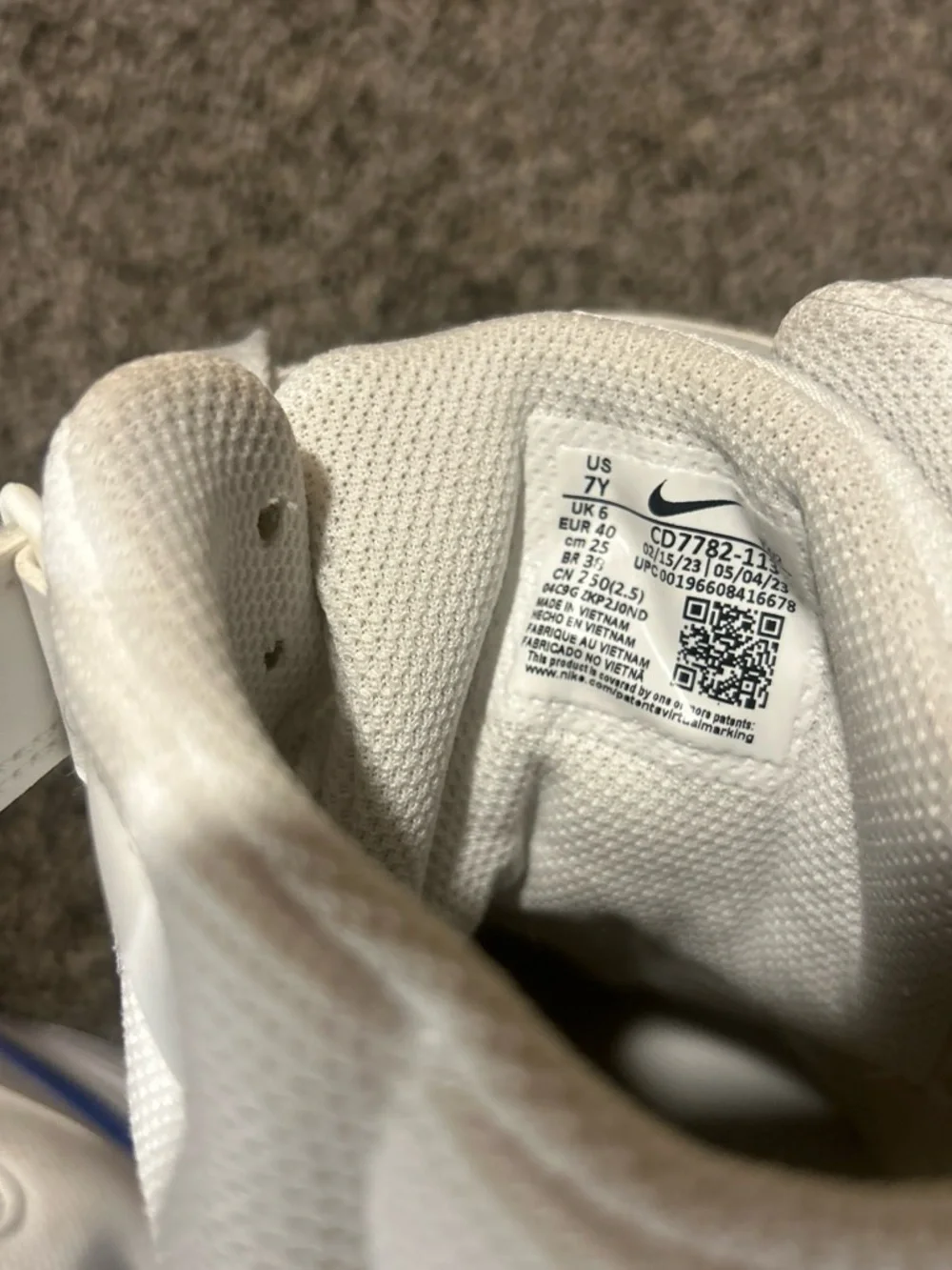 Nike White and Blue Mid-Top Sneakers